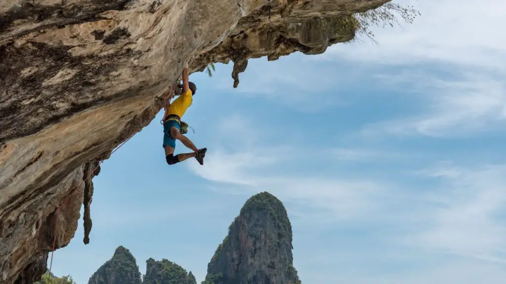 man doing rock climbing